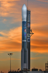 The Boeing Delta II launch vehicle for NASA's Swift spacecraft is silhouetted against a rosy sky at sunrise, waiting for liftoff scheduled for 12:16:00.611 p.m. EST from Launch Pad 17-A on Cape Canaveral Air Force Station, Fla.